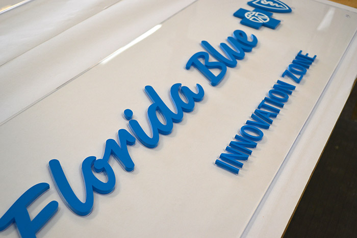 "Florida Blue" channel cut letter on acrylic backing